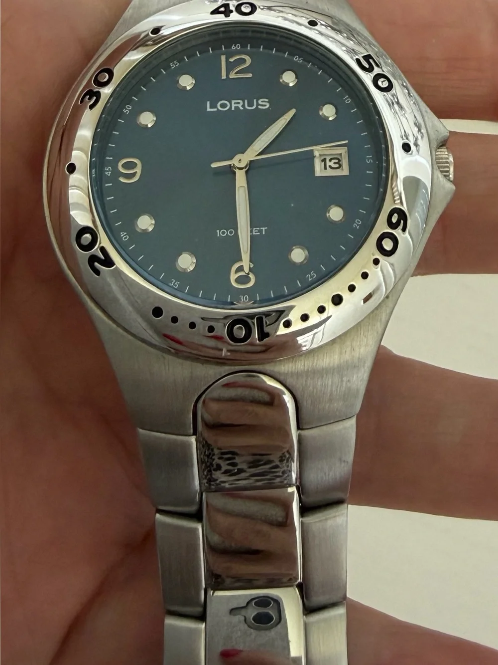 The Lorus Quartz Silver Tone Bracelet Watch with a Blue Dial